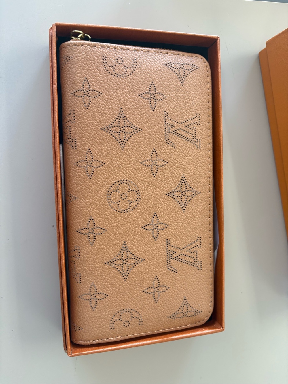 Source Unknown Beige Perforated Monogram Zip Wallet